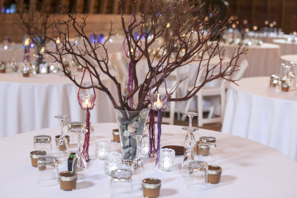 Rustic table setting for a wedding in The Barn at Holly Farm