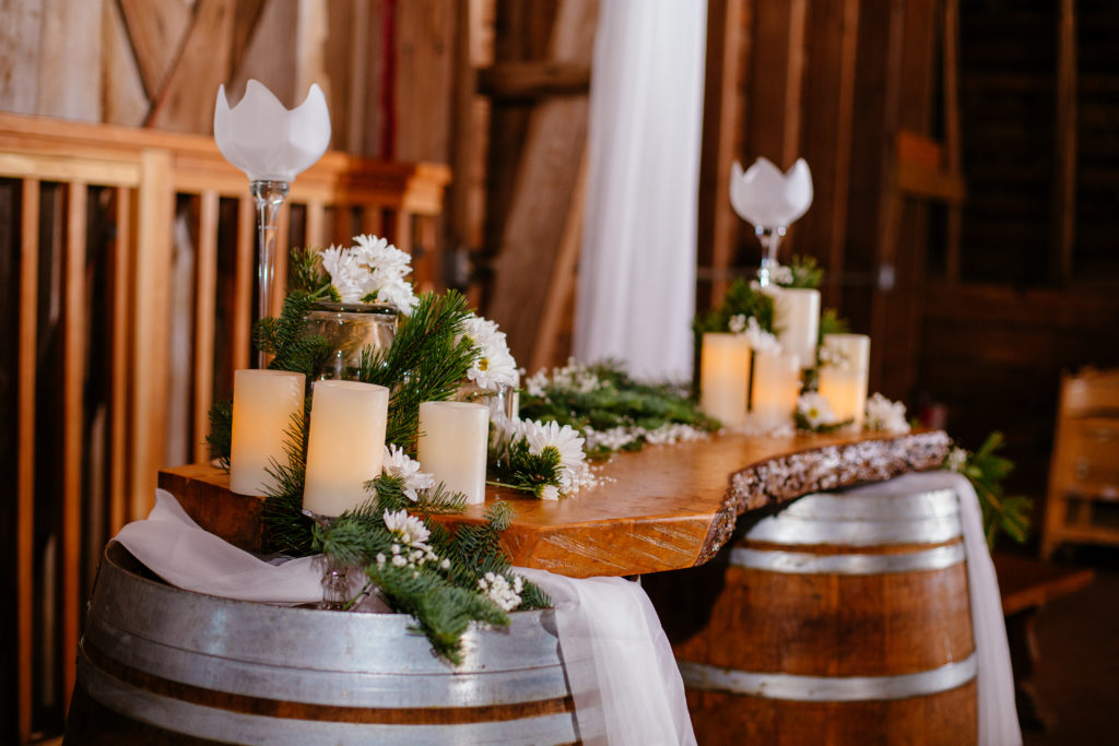 Wine barrels and raw wood make a beautiful altar or counter